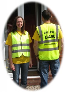 Couple Wearing Campaign Tabards in Different Sizes